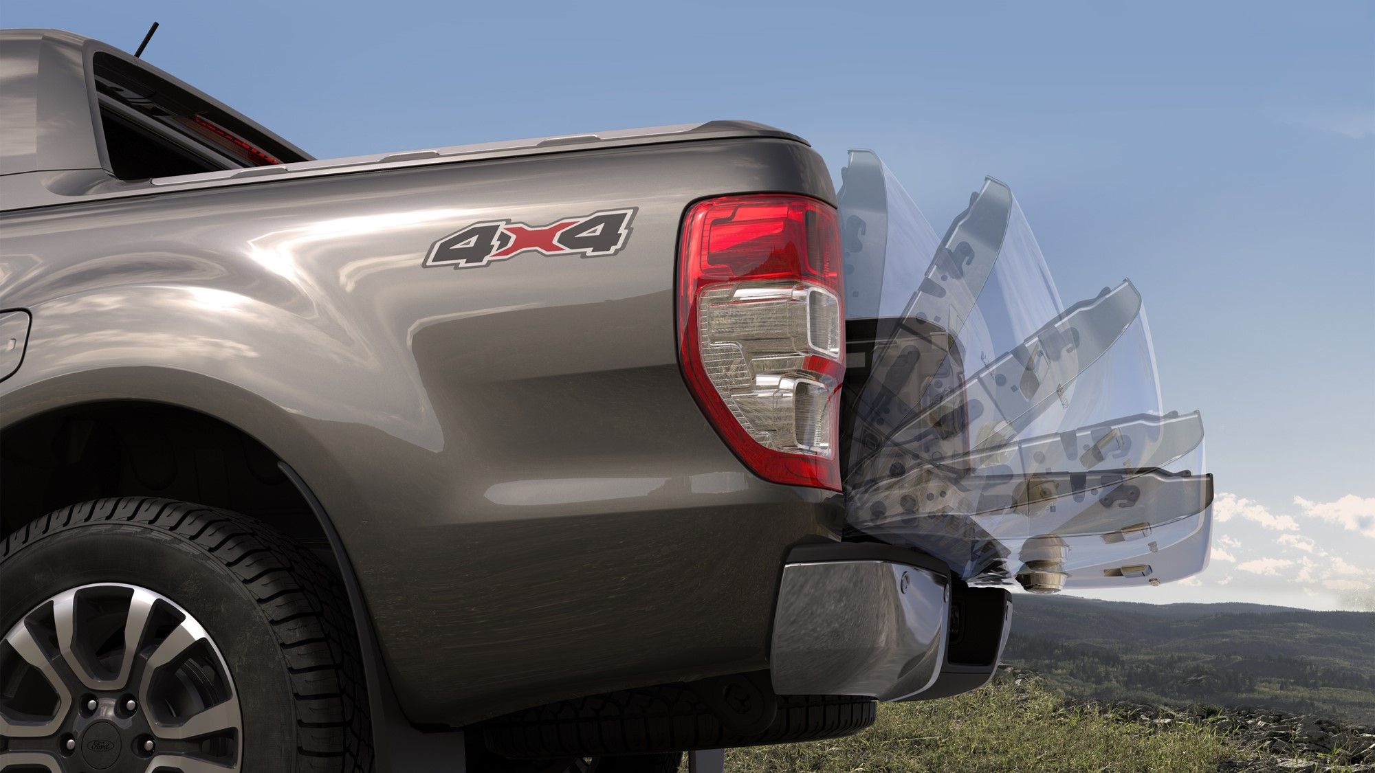 Portón de caja de carga con asistencia